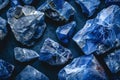 sodalite crystals geode close up on black background, esoteric blue mineral texture on dark surface Royalty Free Stock Photo