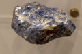 Sodalite purple collection stone on display selective focus