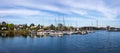 Sodertalje, Sweden - May 11, 2021: Panoramic view on the harbour in Igelsta in Sodertalje with sailboats on sunny afternoon in May