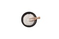 Sodium Benzoate, sodium salt of benzoic acid in wooden scoop on black plate. White crystalline powder. Food additive E211, Royalty Free Stock Photo