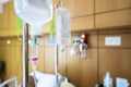 Sodium chloride or saline solution fluid iv irrigation transparent drip bag and tubing at room in hospital Royalty Free Stock Photo