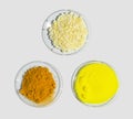 Sodium sulfide flake, Potassium Chromate and Organic Curcuma Powder in Chemical Watch Glass. Closeup chemical ingredient on white