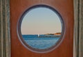 Sodus Bay Lighthouse on Lake Ontario seen through a Boat Porthole