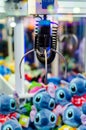 Soest, Germany - November 02, 2022: A claw crane game machine with toys Royalty Free Stock Photo