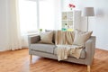 Sofa with cushions at cozy home living room