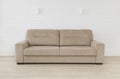 Sofa in living room interior on white brick wall background Royalty Free Stock Photo