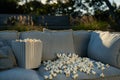 sofa in outdoor setting with popcorn for openair movie