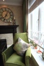 Sofa with pillow by the window Royalty Free Stock Photo