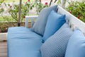 Sofa with pillows on gardenbackground Royalty Free Stock Photo