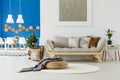 Sofa, plants and blue wall Royalty Free Stock Photo