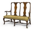 Sofa 2 seater settee wood en framed bright upholstery Royalty Free Stock Photo