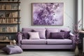 Sofa with violet pillows against window near wall with poster and bookcases, Scandinavian home interior design of modern room