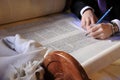 Sofer completing the final letters of sefer Torah Royalty Free Stock Photo