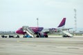 Sofia , Bulgaria - APRIL 13, 2015: Airplane is near the terminal gate ready for takeoff. Crew is preparing the plane for flight. Royalty Free Stock Photo