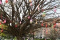 SOFIA, BULGARIA - April 15, 2023: National Palace of Culture. The big tree has lots of colorful lights on it.