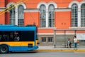 People wait at bus stop in Sofia, Bulgaria