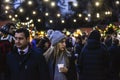 SOFIA, BULGARIA - DECEMBER 21: A girl with a cup of mulled wine walking