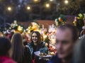 SOFIA, BULGARIA - DECEMBER 21: A girl walking with a paper plate with churros at the Christmas market