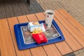 McDonald`s Filet-O-Fish menu with McDonald`s fish sandwich known as Filet-O-Fish, french fries and Coca-Cola