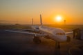 SOFIA, BULGARIA - March, 2019: Indigo commercial airplanes at sunrise at the airport ready to take off. Plane flight delays, Royalty Free Stock Photo