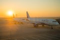 SOFIA, BULGARIA - March, 2019: Indigo commercial airplanes at sunrise at the airport ready to take off. Plane flight delays,