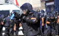 Sofia, Bulgaria on September 2, 2020: Heavily armed police officers holding spraying tear gas bottle