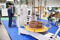 Sofia, Bulgaria, September 30, 2025 Man operator works on wire bending machines on exhibition Royalty Free Stock Photo