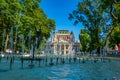 SOFIA, BULGARIA, SEPTEMBER 2, 2018: People are enjoyingg sunny summer day next to the fountain in front of the Ivan Vazov theatre Royalty Free Stock Photo