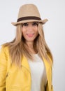 Sofia in photographic studio with a beige hat Royalty Free Stock Photo