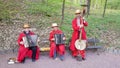 A group of musicians in Ukrainian national costumes. Clothing and musical instruments are