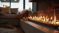 Soft and ambient lighting radiates from the linear gas fireplace creating a cozy and inviting ambiance in the room. 2d Royalty Free Stock Photo