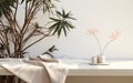 Soft beige cotton tablecloth on counter table tropical dracaena tree in sunlight on white wall background for luxury fresh organic