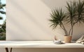 Soft beige cotton tablecloth on counter table tropical dracaena tree in sunlight on white wall background for luxury fresh organic