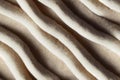 Soft beige fur texture fabric animal hair wavy seamless pattern abstract background. Fluff clothing fashion material