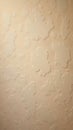 Soft beige textured limestone wall background with natural pitting Royalty Free Stock Photo