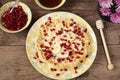 Soft Belgian heart shaped waffles with banana and pomegranate, sugar decoration stars, covered with honey. Rustic backgroun