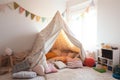 soft blanket and pillow fort, with pillows for seating, in child's room Royalty Free Stock Photo