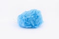 Soft blue bath puff or sponge isolated on white background