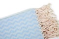 Soft blue peshtemal towel folded colorful textile for spa, beach, pool, light travel, healthy fashion and gifts. Tradition