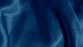 Soft blue silk folds create a hypnotic effect with smooth flowing patterns.