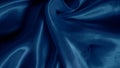 Soft blue silk folds create a hypnotic effect with smooth flowing patterns.