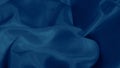 Soft blue silk folds create a hypnotic effect with smooth flowing patterns.