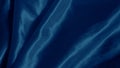 Soft blue silk folds create a hypnotic effect with smooth flowing patterns.