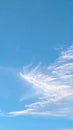 Soft Blue Sky with Wispy White Clouds Royalty Free Stock Photo