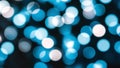 Soft blue and white blurred circular lights forming a glowing abstract bokeh background Royalty Free Stock Photo