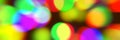 Soft blur colorful bokeh lights on dark background concept for modern holiday banner. Vintage glowing motion blur Royalty Free Stock Photo