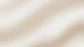 A soft, blurred background with gentle waves of creamy beige and off-white colors creating a smooth, flowing, and texture subtle Royalty Free Stock Photo