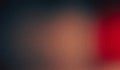Soft blurred gradient background featuring a smooth blend of dark brown, red, and black hues. Royalty Free Stock Photo