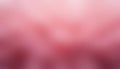 Soft blurred gradient of pink and red hues creating an abstract background Royalty Free Stock Photo