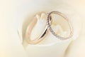 Soft blurred of wedding ring on a rose pastel color style background. Royalty Free Stock Photo